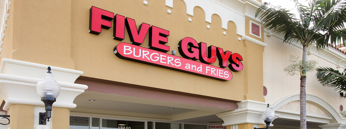 Five Guys Burgers and Fries exterior signage at London Square